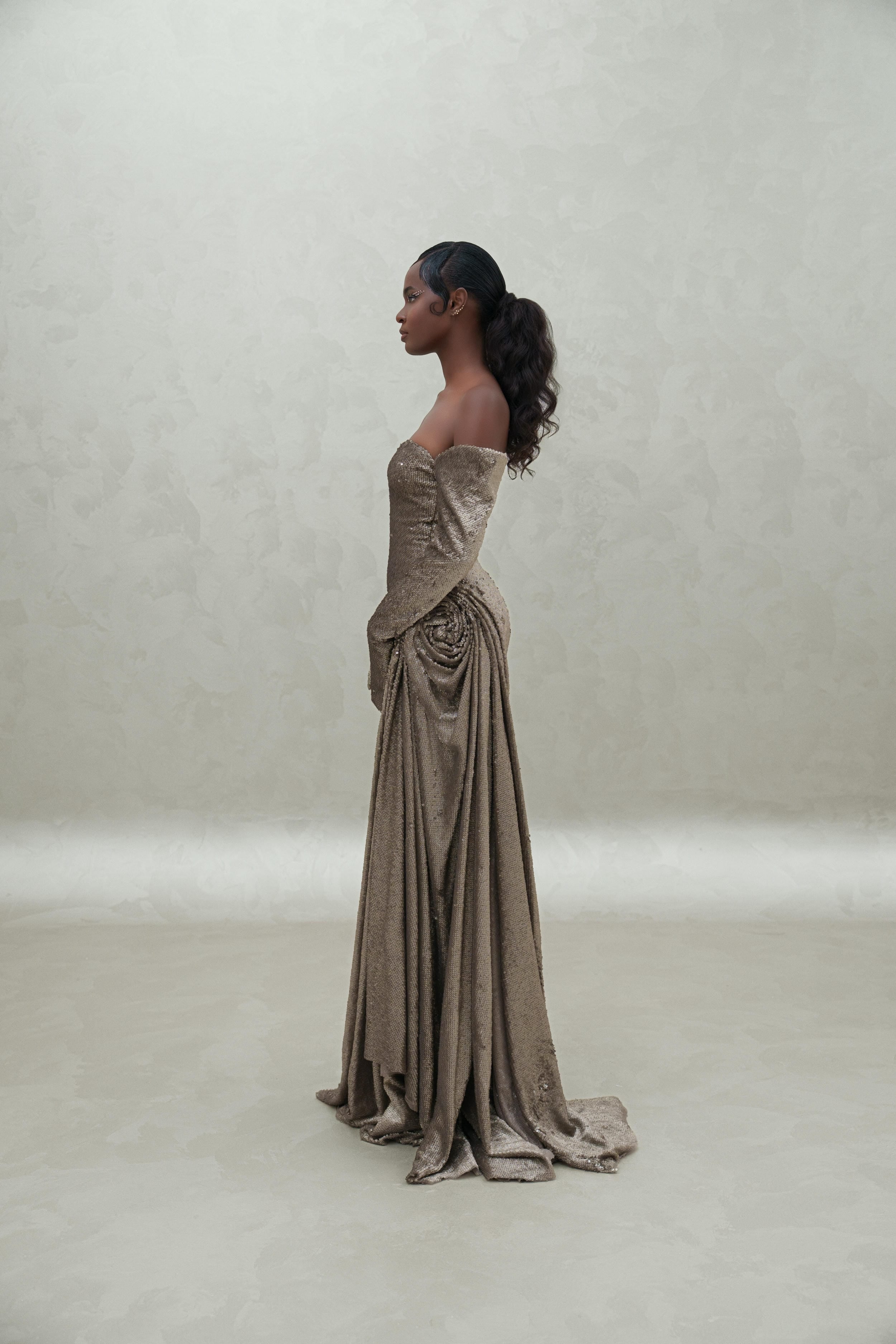 sequined dress with sewed gloves