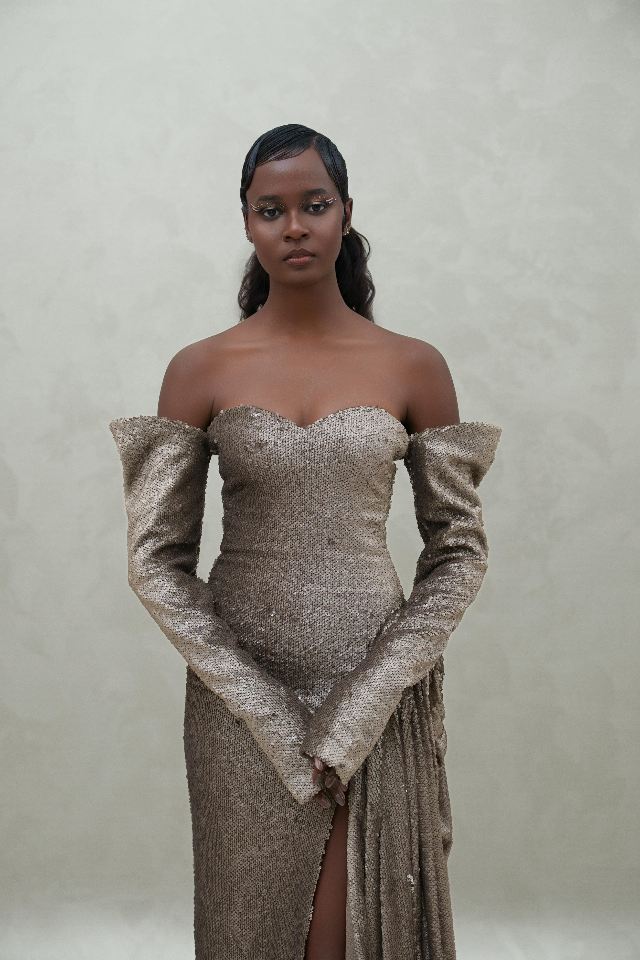 sequined dress with sewed gloves
